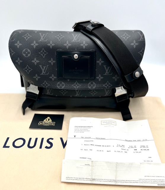 Louis Vuitton Monogram Eclipse PM Voyager Bag.