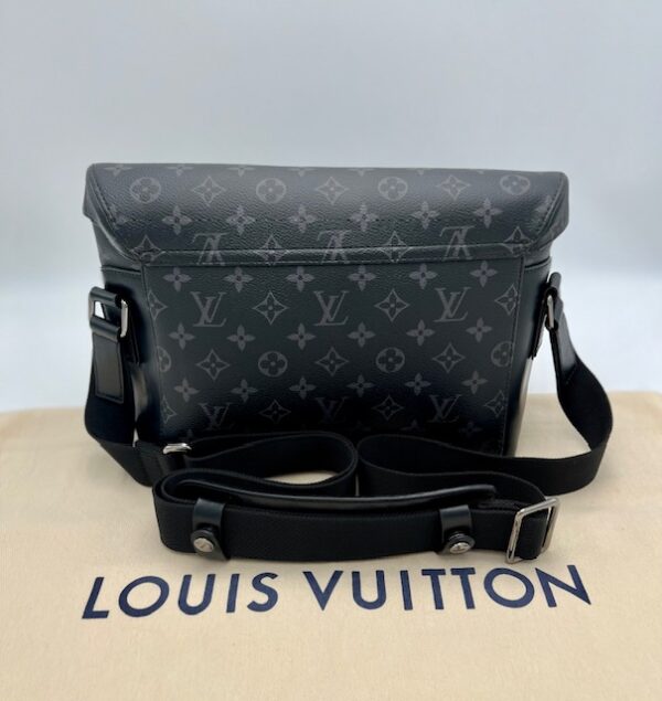 Louis Vuitton Monogram Eclipse PM Voyager Bag.