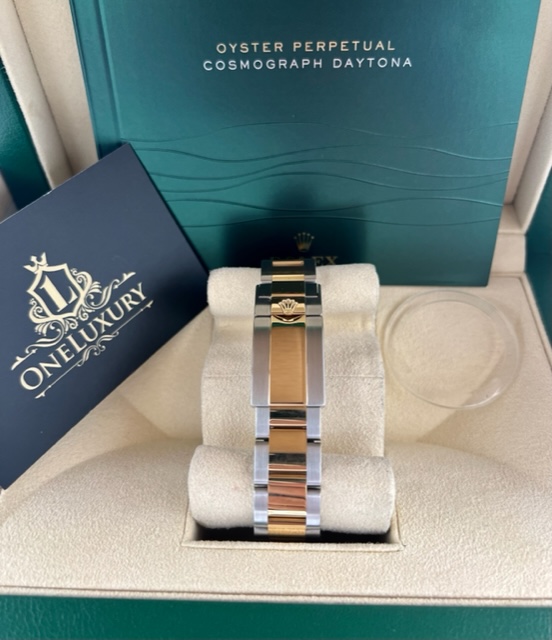 Rolex Cosmograph Daytona Steel and Gold 116523 with rare APH dial